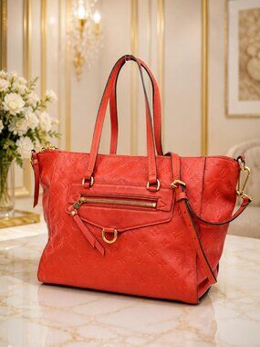 Authentic Louis Vuitton Lumineuse PM Monogram Empreinte Orange Leather Tote Bag
